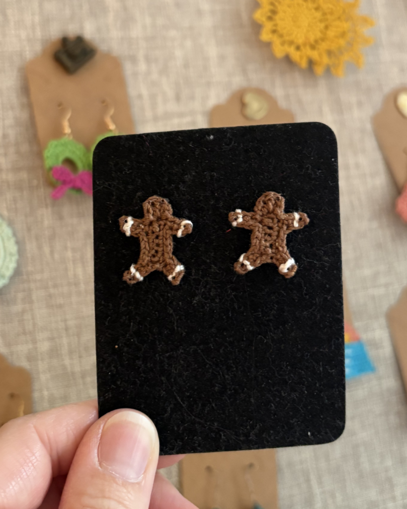crochet gingerbread earring pattern photo of two small crocheted gingerbread men
